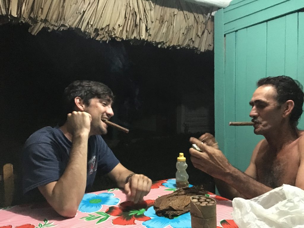 My son Ben sharing a cigar and a laugh with the farmer who was our host in Vinales, Cuba.